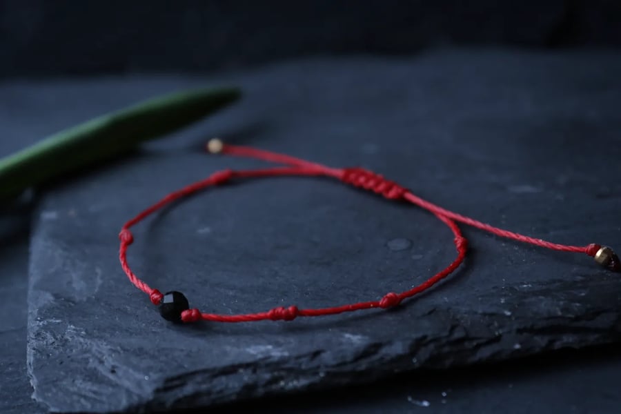 Women's red string bracelet with tourmaline 