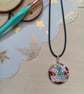 Quirky circular patterned hand painted wooden necklace 
