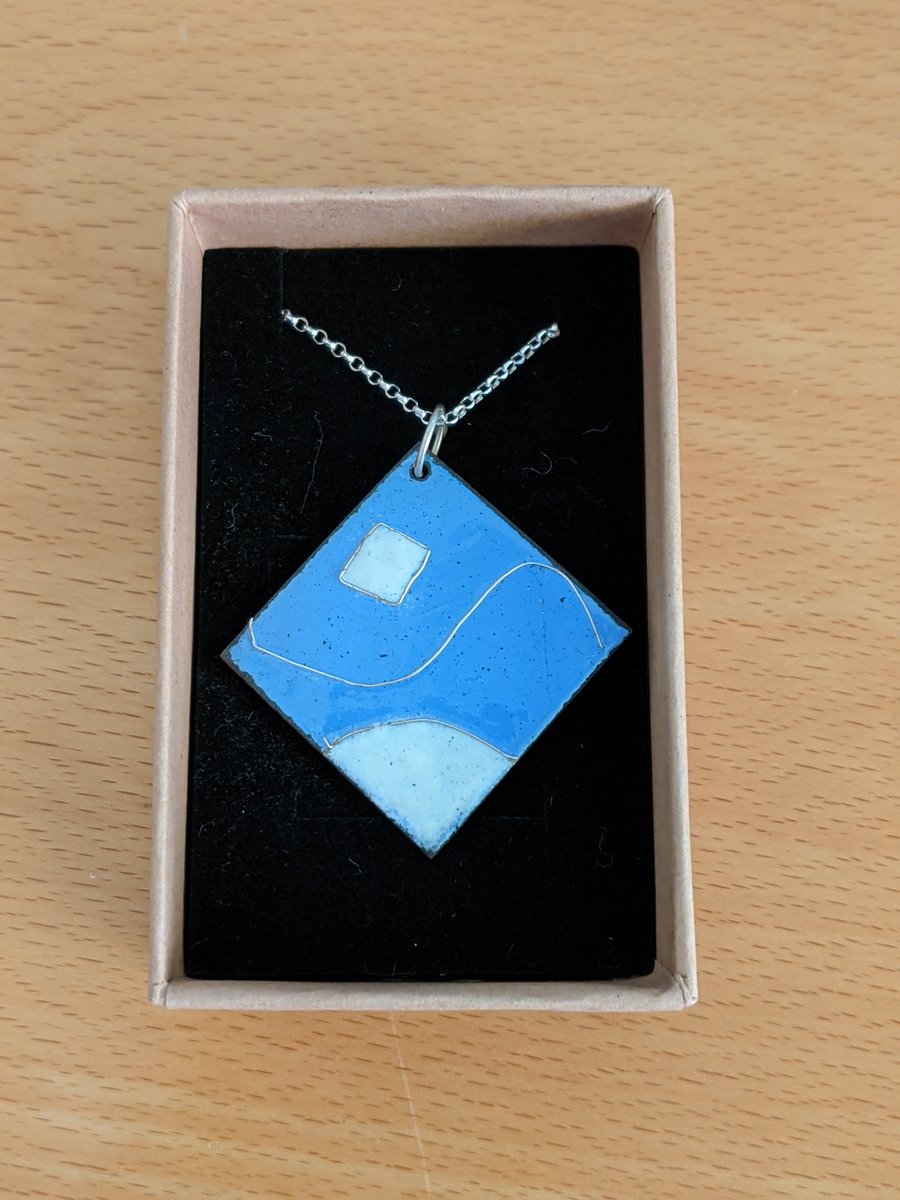 Enamelled blue and white abstract cloisonné  onto copper with solid silver chain
