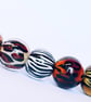 Handmade animal print patterned lamp work glass beads - Image 3