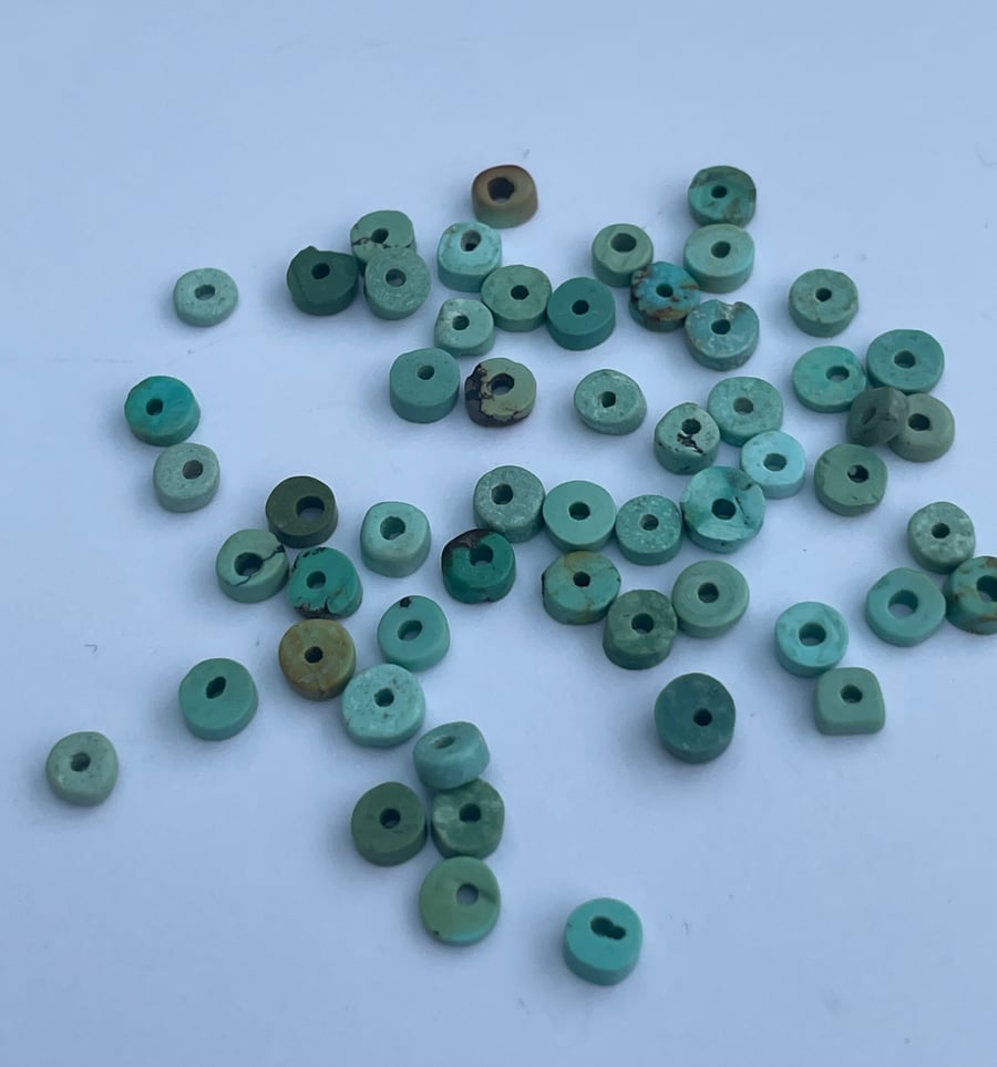 2.5g Chinese turquoise disc drilled beads