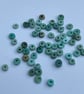 2.5g Chinese turquoise disc drilled beads - Image 1