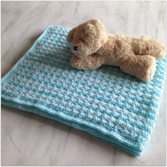 Hand Crocheted Baby Blanket in shades of aqua to fit pram or cot