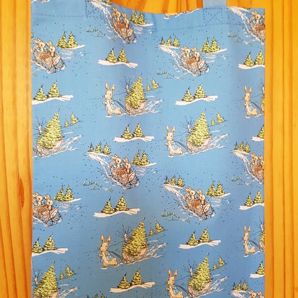 Peter Rabbit fabric Christmas gift bag;  Peter collects this tree