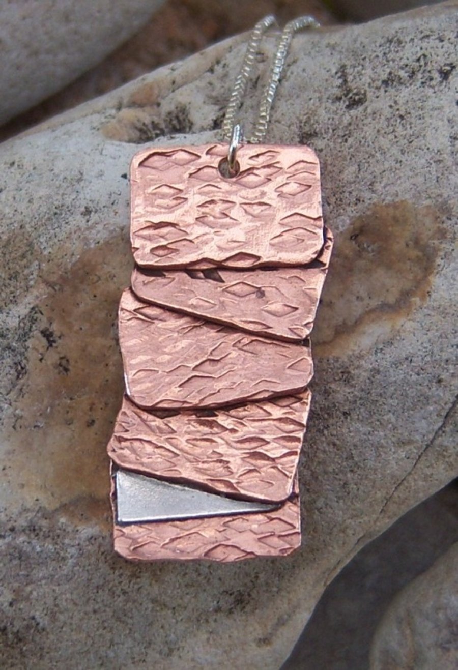 Pendant with copper and sterling silver slices