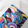 Glasses case in a multi- coloured bubble print