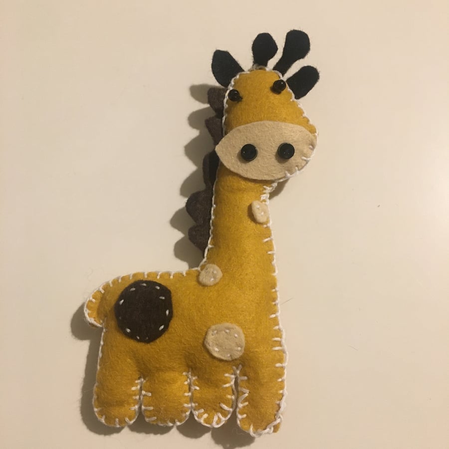 Toy felt giraffe plushie