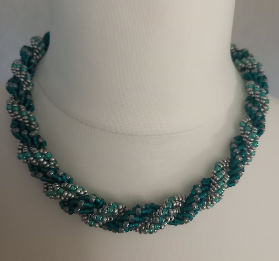 Hand woven beaded spiral necklace