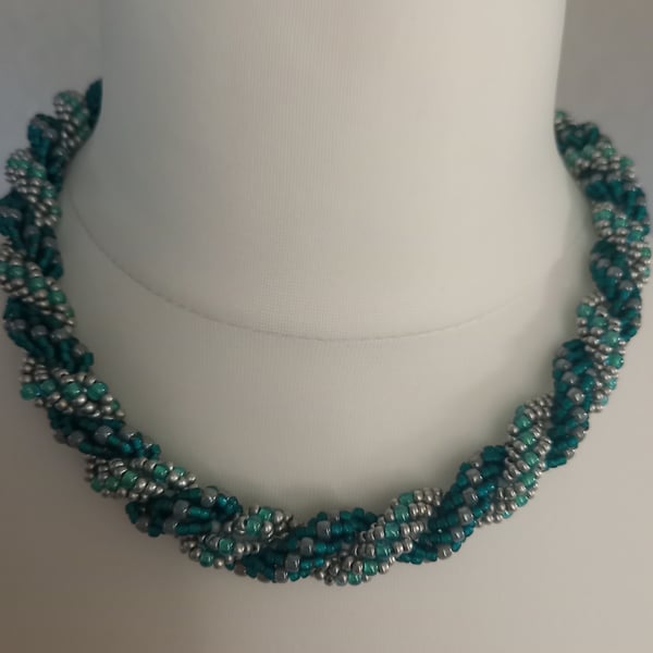 Hand woven beaded spiral necklace