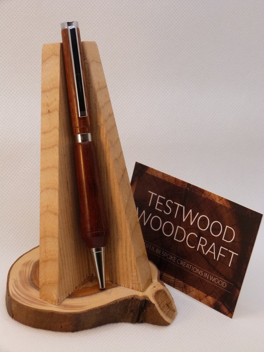 Handturned wooden pen with silver trim
