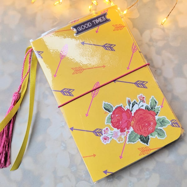 Pretty pocket size journal in a bright Mexican theme .