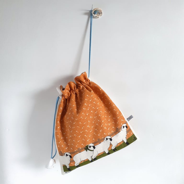 Upcycled drawstring bag from a vintage tea towel with sheep print