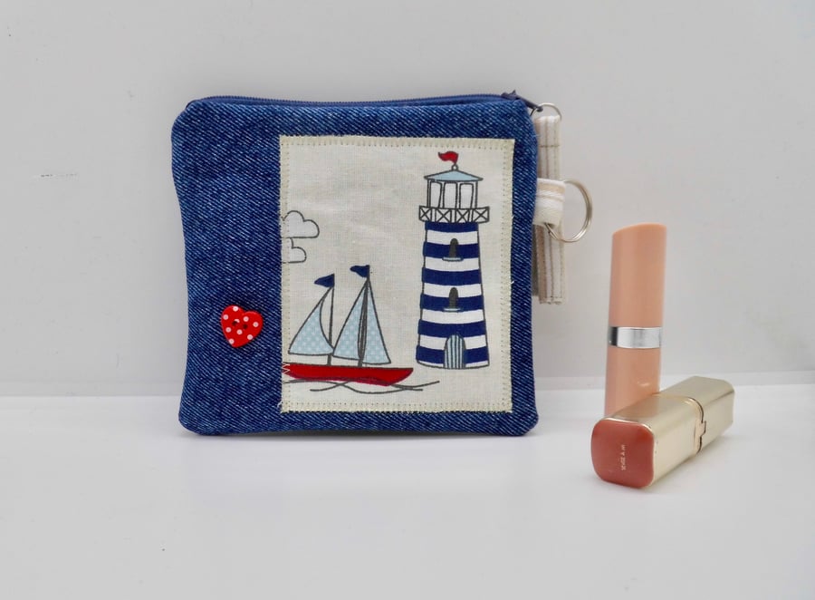 Denim coin purse with lighthouse and sailing boat motif