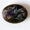 enamelled brooch: white, and amethyst on black over clear enamel