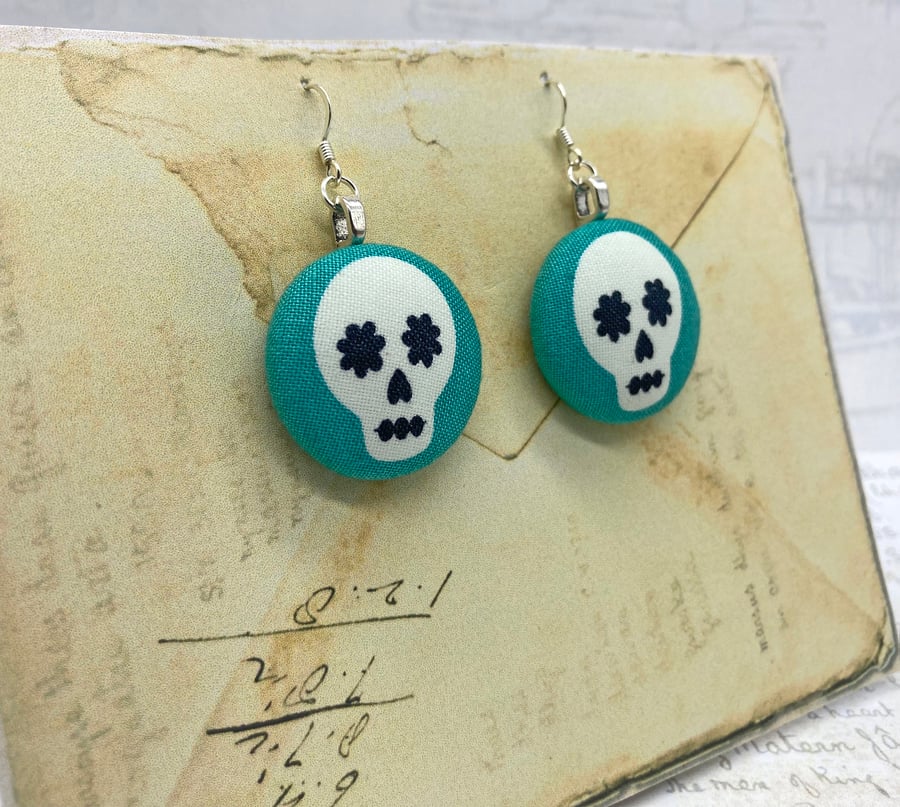Skulls on aqua fabric button statement earrings Halloween inspired