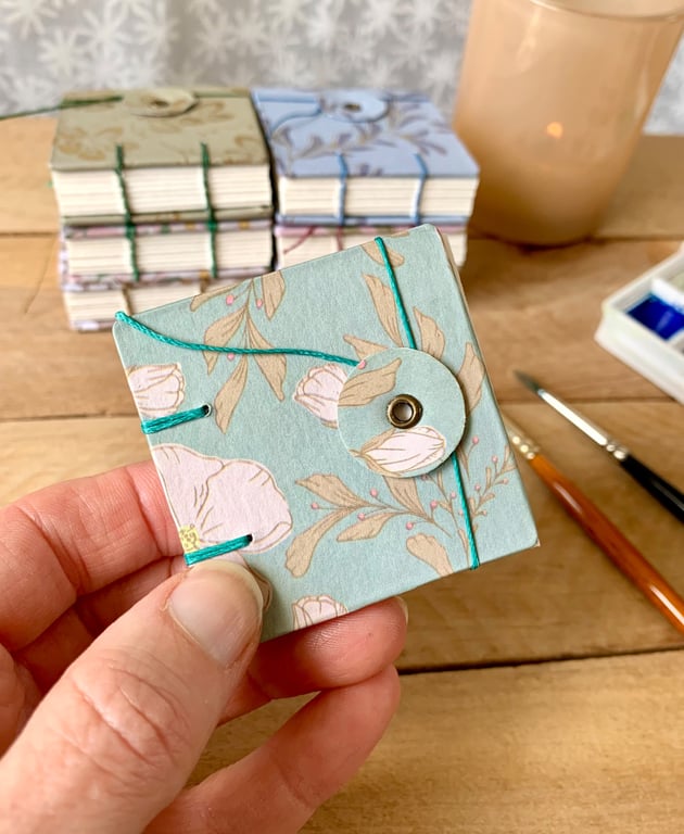 Coptic Bound Tiny Floral Watercolour Sketchbook. Green, white and beige.