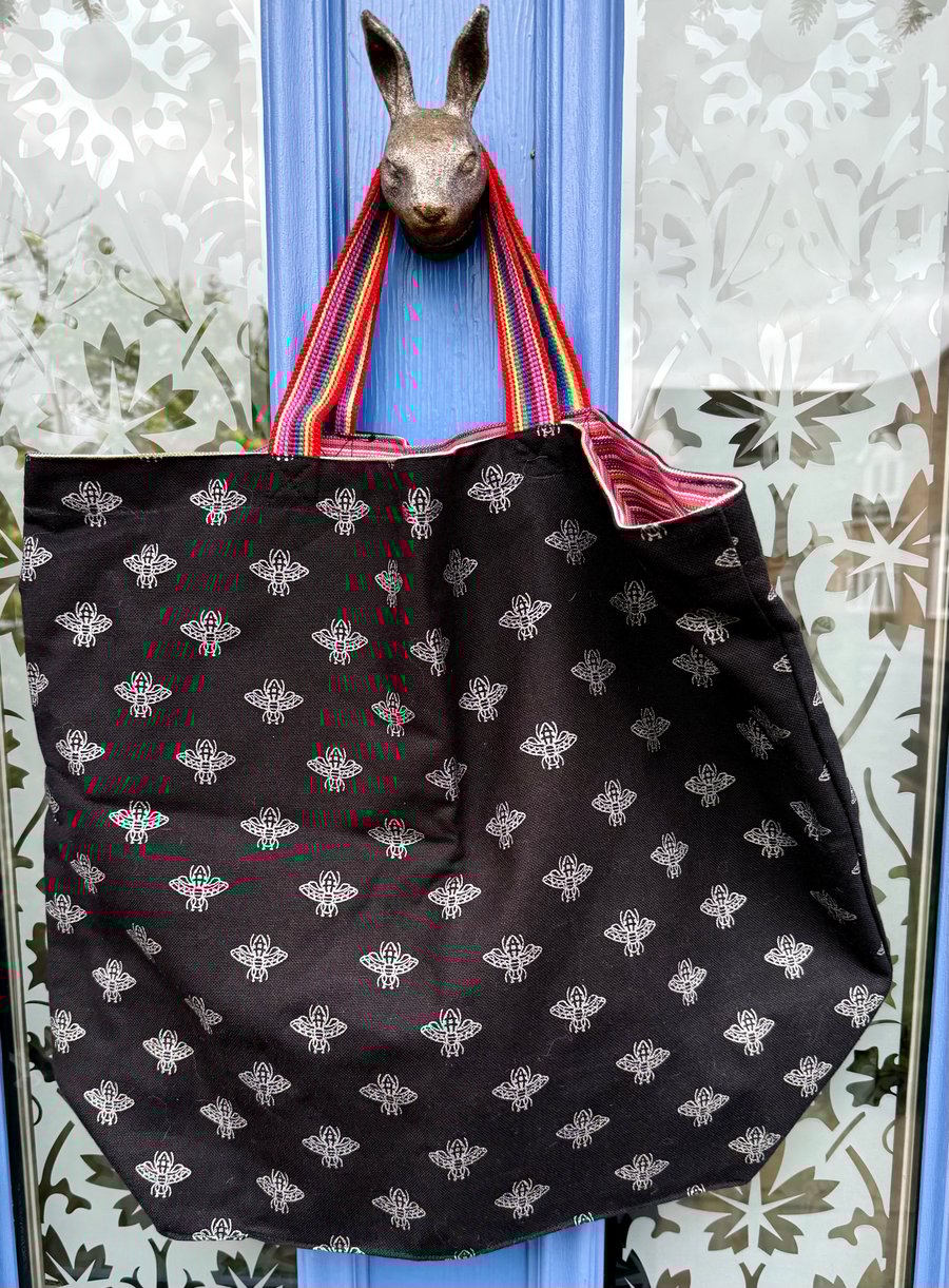 Large silver bee tote bag - black cotton canvas with pink-striped lining 
