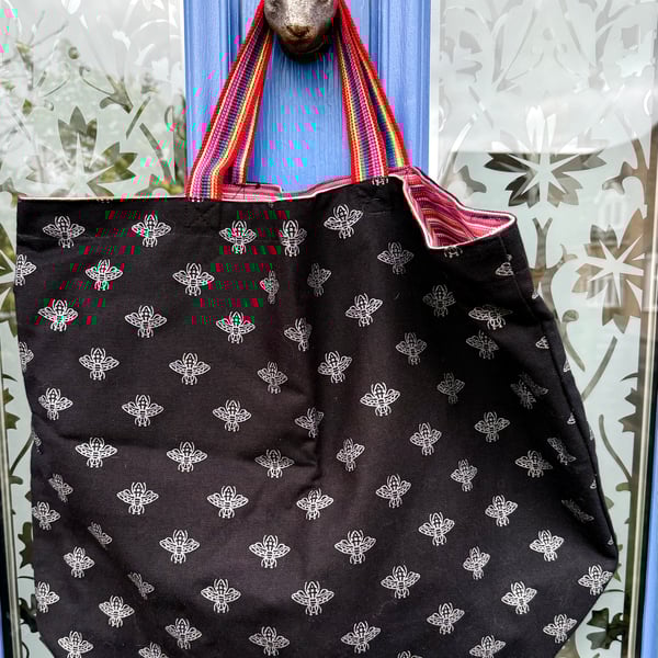 Large silver bee tote bag - black cotton canvas with pink-striped lining 