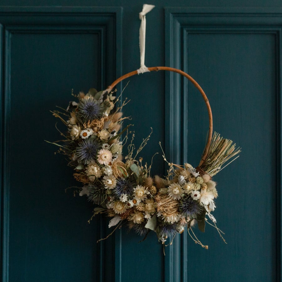 Image of Blue thistle, Eucalyptus and white strawflower festive winter wreath