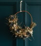 Blue thistle, Eucalyptus and white strawflower festive winter wreath