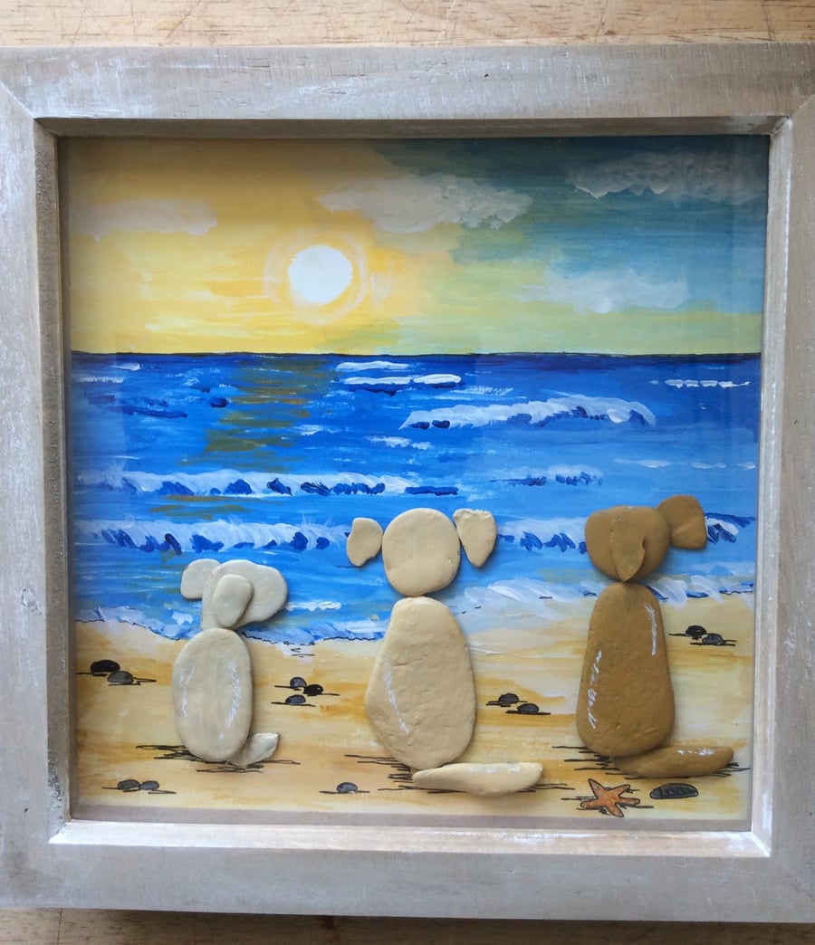 Pebble Art Picture.  Three Golden Retrievers  on the Beach. 9” by 9”