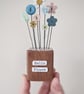 Clay Flower and Button Garden in a Wood Block 'Hello Flower' - Image 1