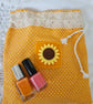 Pretty orange polka dot sun flower drawstring bag