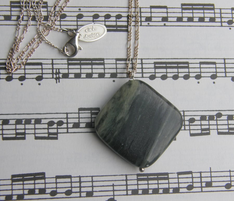 Green banded agate pendant on a figaro necklace