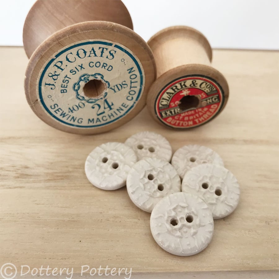 Set of six little cream coloured round ceramic handmade buttons