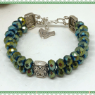 One of a Kind Bird green double bangle style bracelet