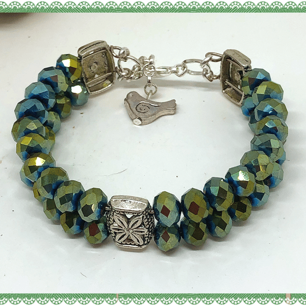 One of a Kind Bird green double bangle style bracelet