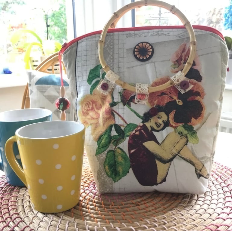 Quirky kitsch retro zipped handbag made in 50's style fabric.