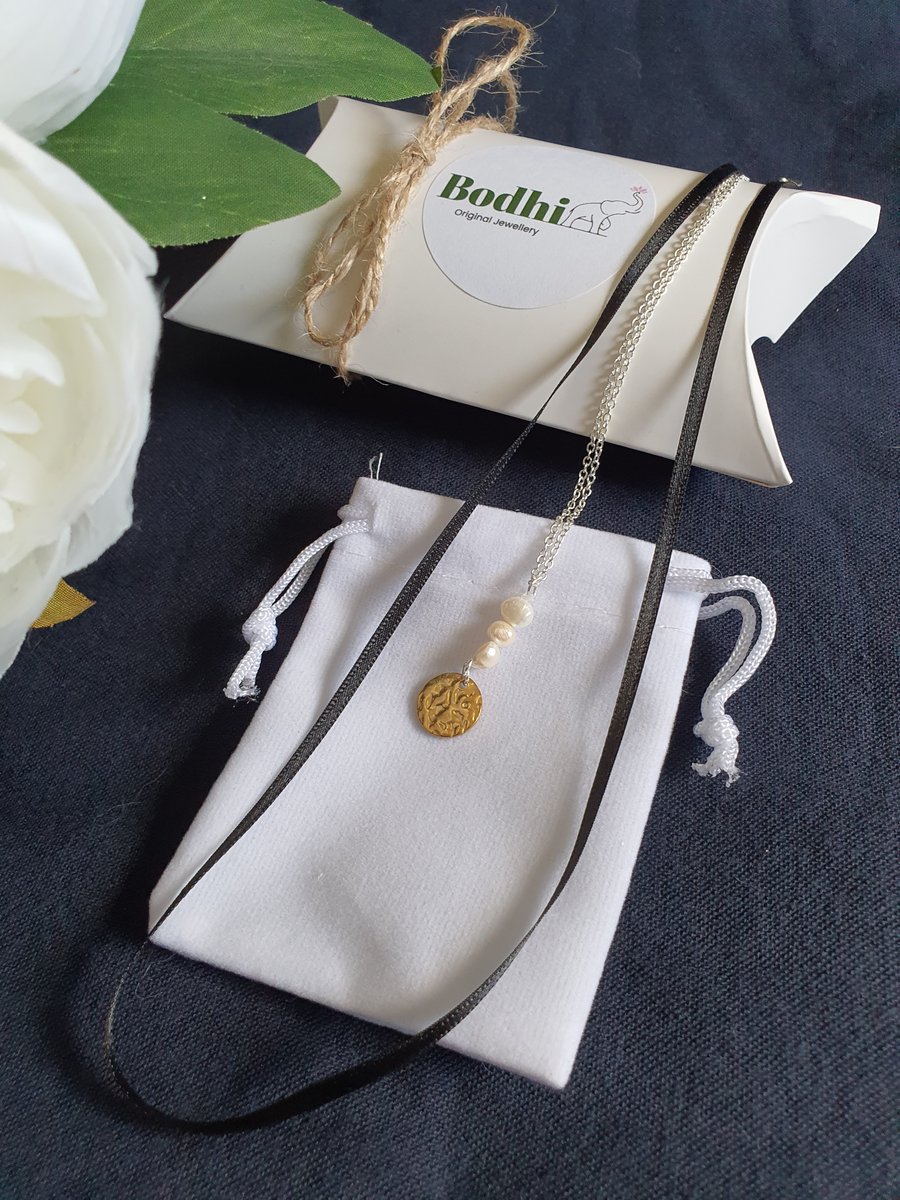 Fresh water pearl charm and ribbon sterling silver necklace