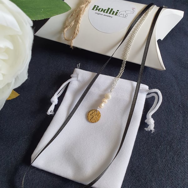 Fresh water pearl charm and ribbon sterling silver necklace