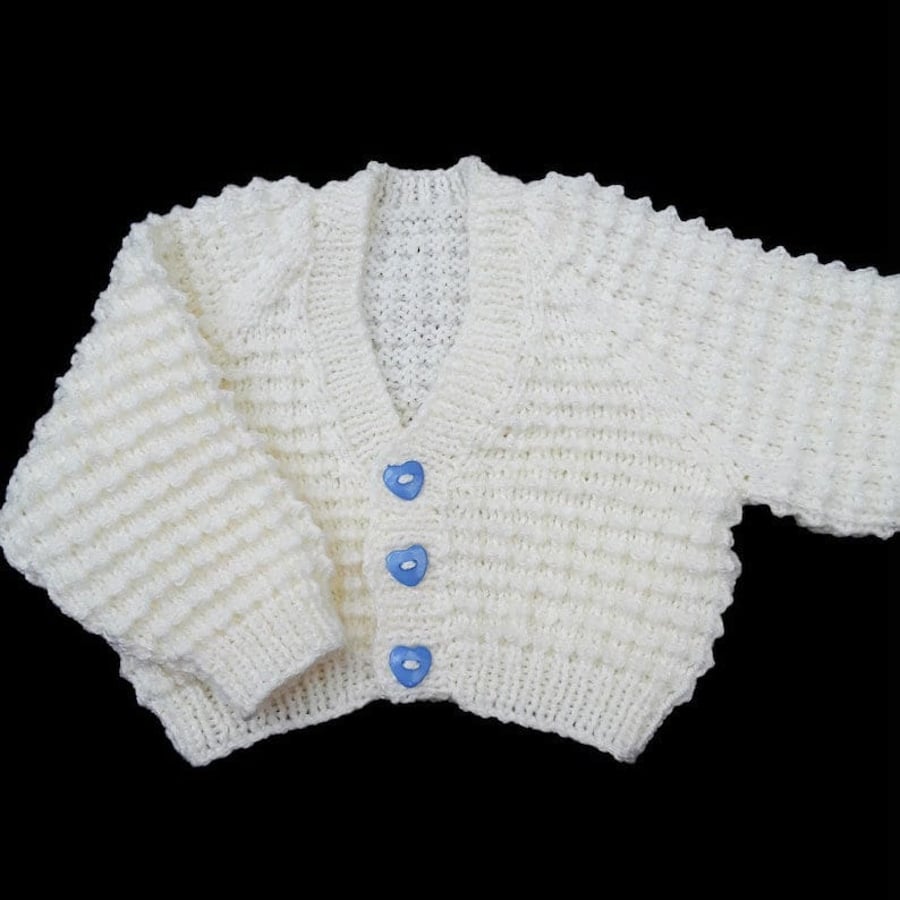 Hand knitted baby cardigan in cream with textured pattern Seconds Sunday