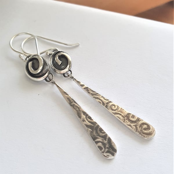 Single spiral silver long dangle earrings - celtic design
