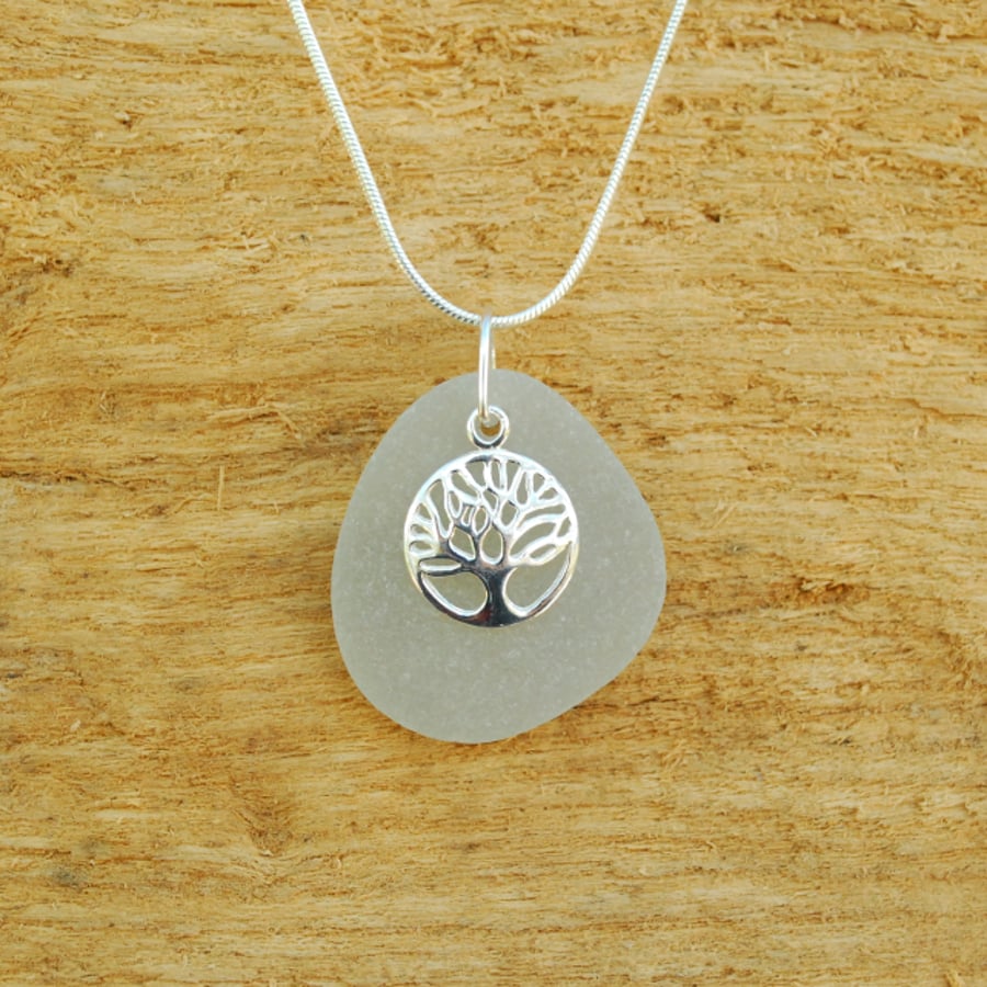 Light grey sea glass pendant with tree of life charm