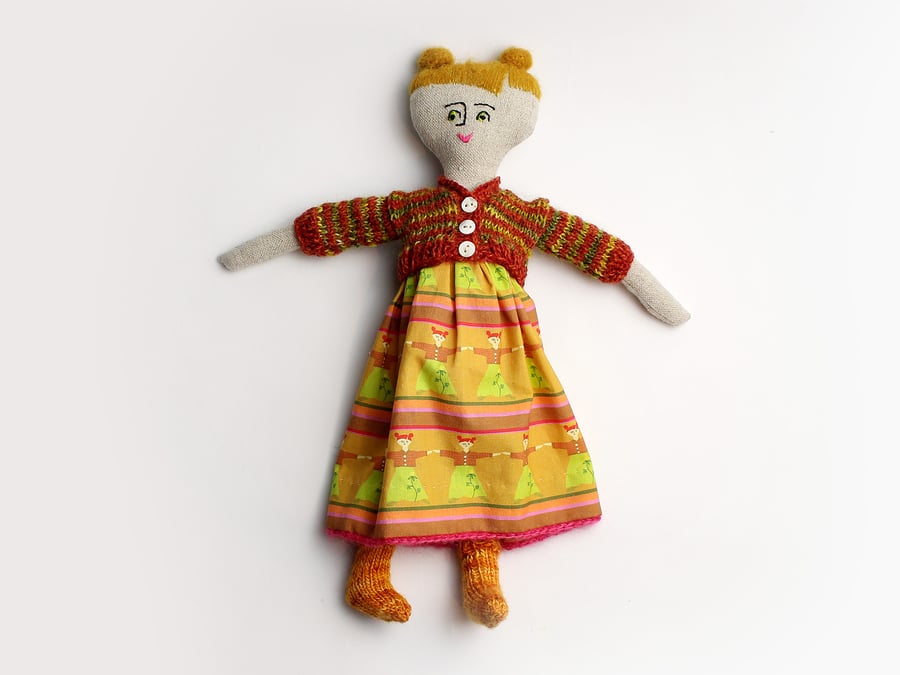 Jenny rag doll with dolly printed dress and hand knitted cardigan and socks