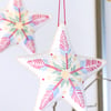 Embroidered Star created by Aprohade embroiderers in Rwanda