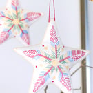 Embroidered Star created by Aprohade embroiderers in Rwanda
