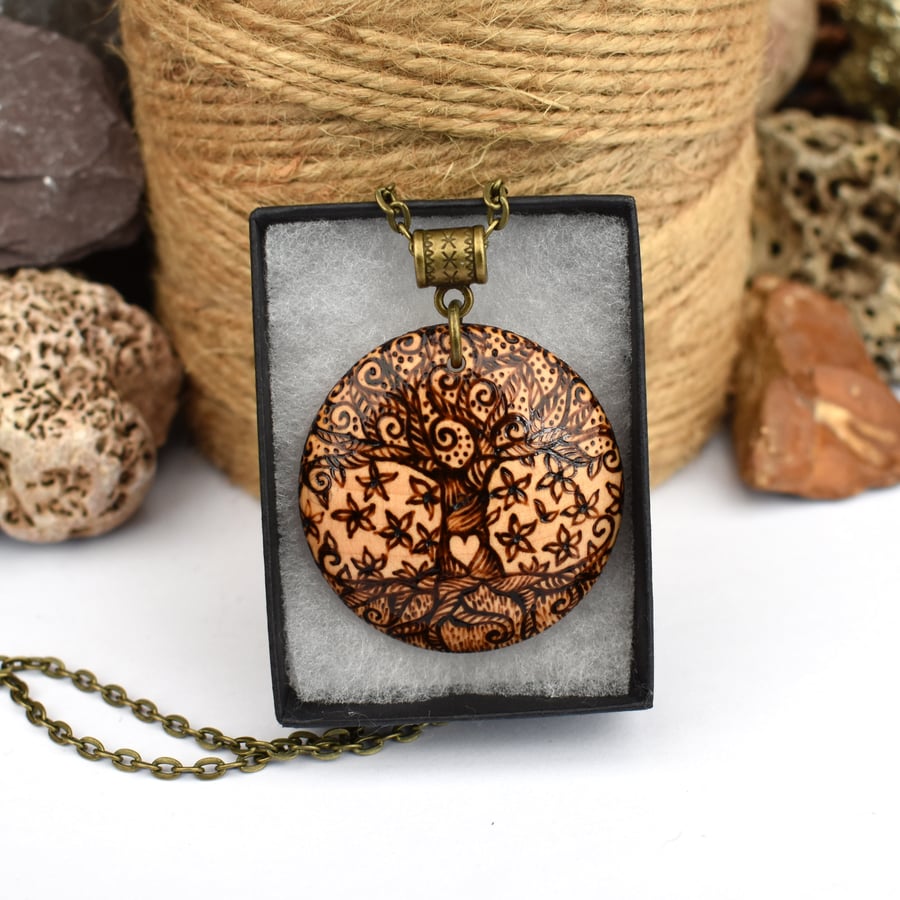 Twisted love tree. Pyrography wood pendant with tree of life. 