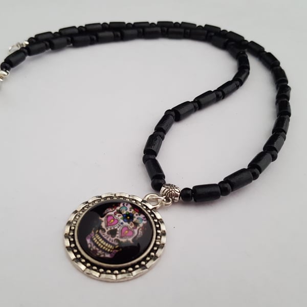 Black wooden bead necklace with sugar skull pendant - 1002538