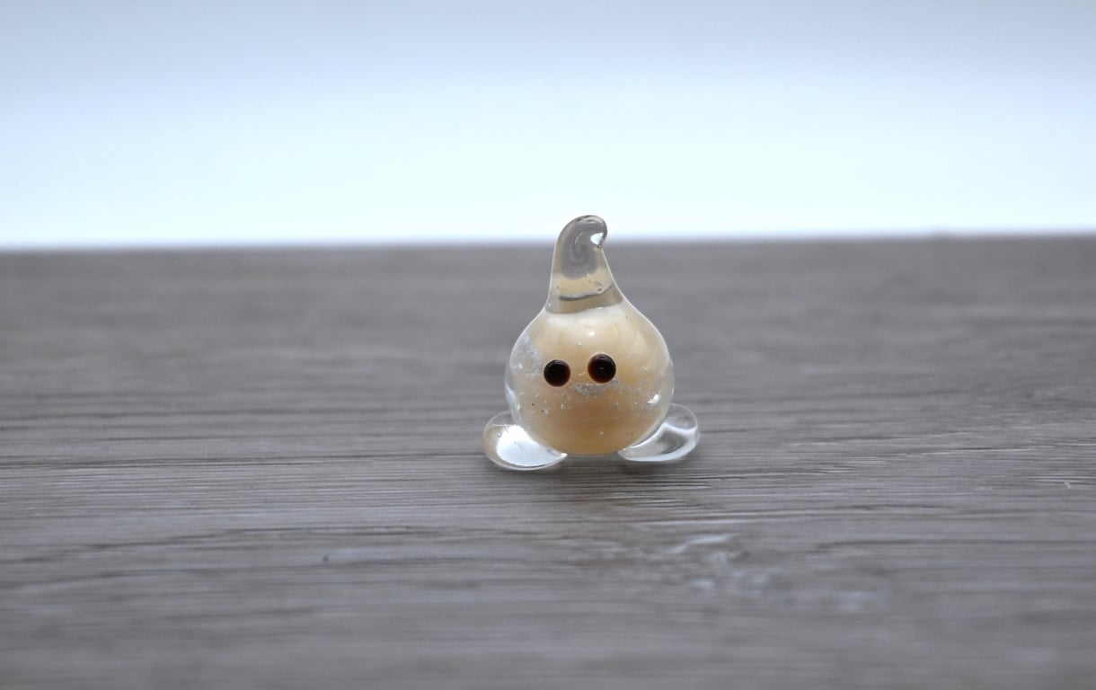 small glass wisp keepsake figure