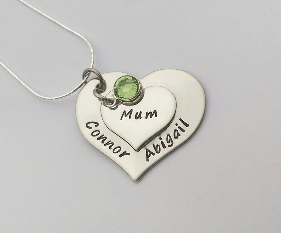 Hand stamped personalised double heart name necklace with birthstones