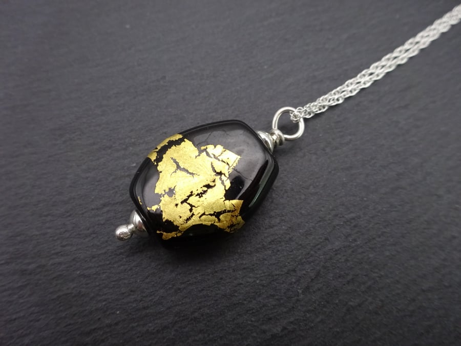 sterling silver chain necklace, black and gold leaf lampwork glass pendant