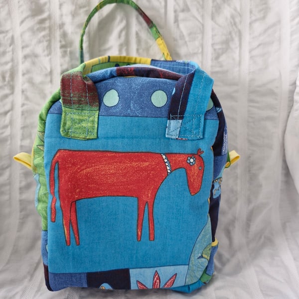 Child size zipped cool bag or lunch bag with insulated facing and animal print