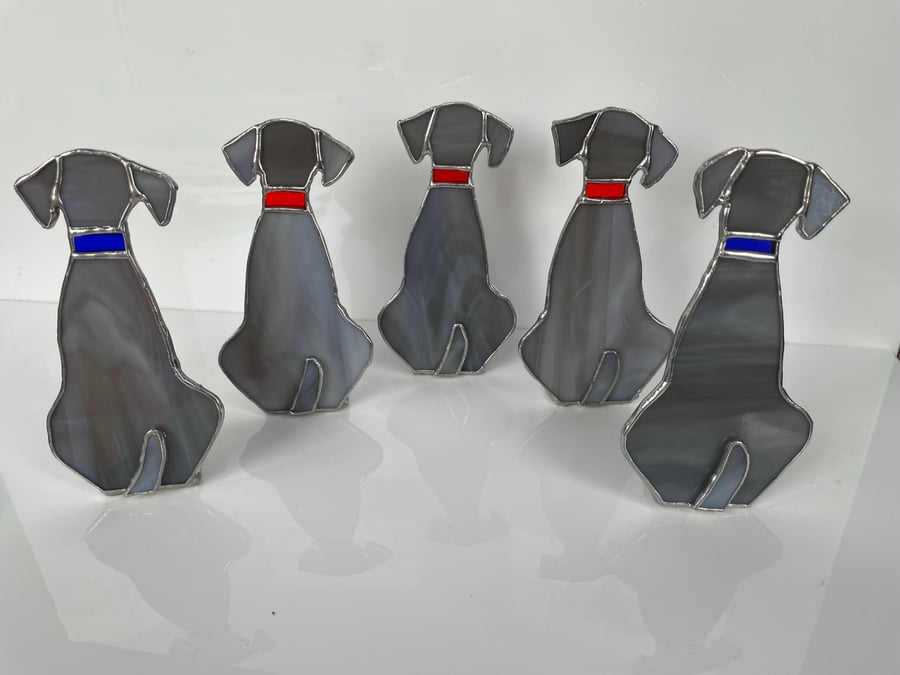 Handmade stained glass grey sitting dog.