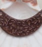 Dark Copper Leaf Pattern Ceramic Crescent Bib Pendant - Image 1