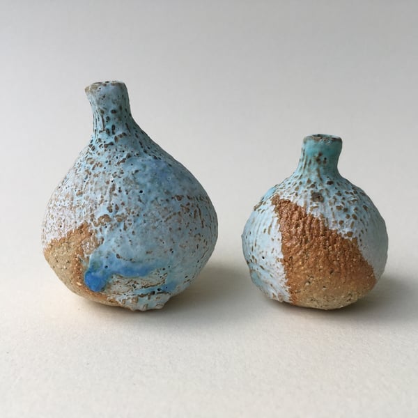 A Pair of Small Ceramic Bottles C