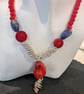 Red Bamboo Coral Pendant complimented by wire wrapped beads - Image 2
